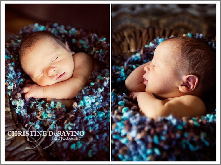 newborn sleeps in beautiful wicker basket with hand knit wrap