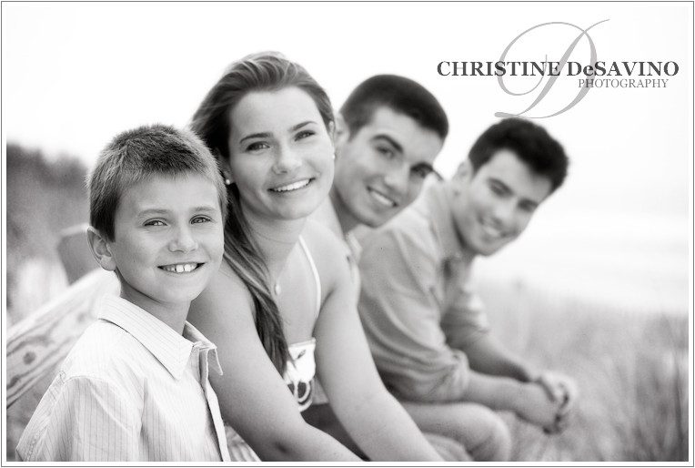 family-looks-into-camera-lbi-nj