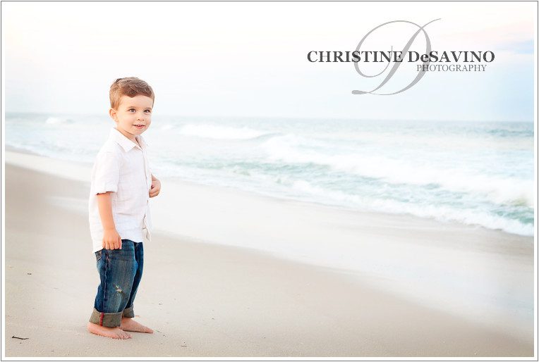Young boy along the ocean shoreline at Long Beach Island
