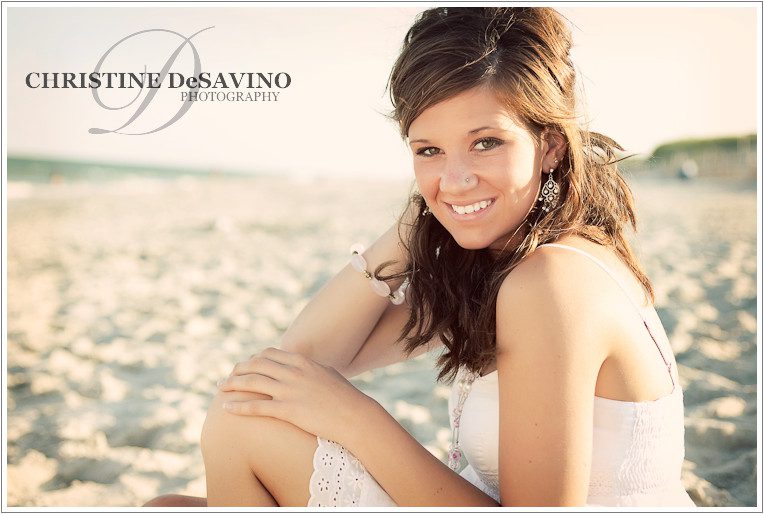 gorgeous high school senior on beach at sunset