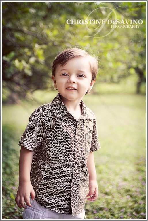 Toddler boy smiling in a field, Wyckoff NJ