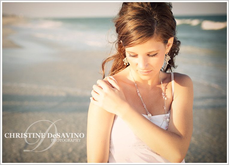 Beautiful teenage girl at ocean's edge on Long Beach Island