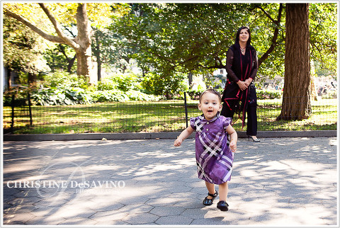 Girl running in Madison Square Park - NYC Child Photographer