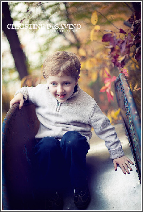 Boy on slide - NY Children's Photographer