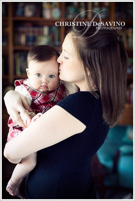 Mother kisses baby girl - NY Baby Photographer