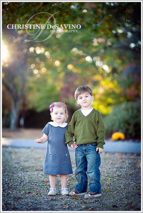 Beautiful girl and boy with sunflare - NJ Children's Photographer