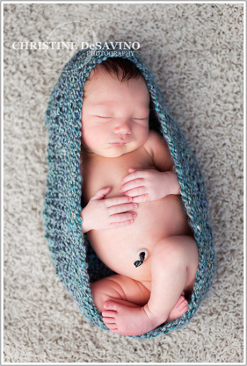 Baby sleeps in bluish-green cocoon - NJ Baby Photographer