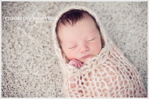 Beautiful baby in peanut wrap - NJ Baby Photographer