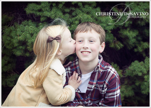 Sister kissing brother - NJ Child Photographer