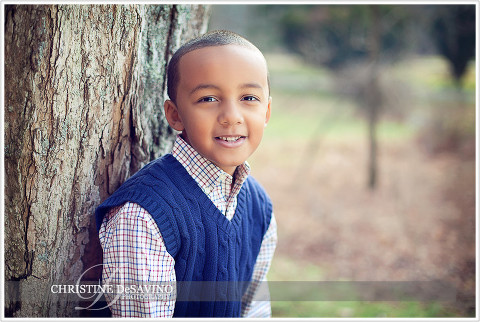 Boy leaning against tree - NJ Child Photographer