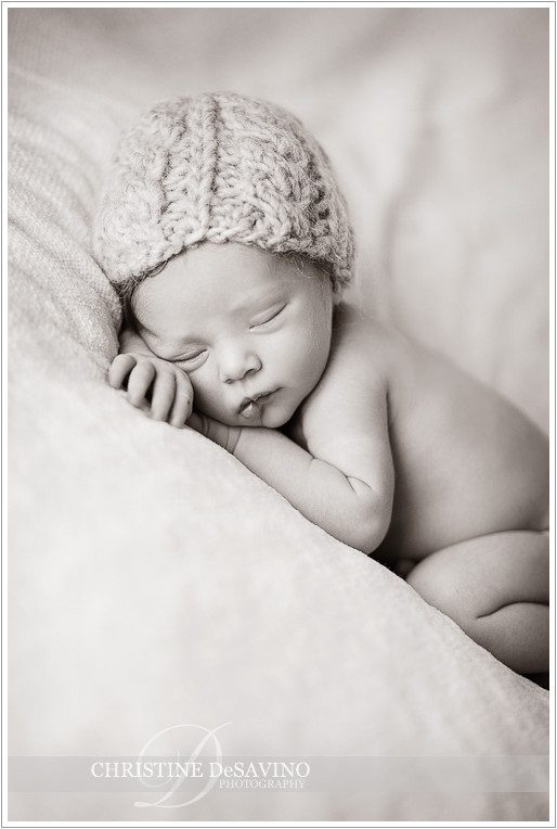 Newborn girl on white with knit hat - NJ Baby Photographer