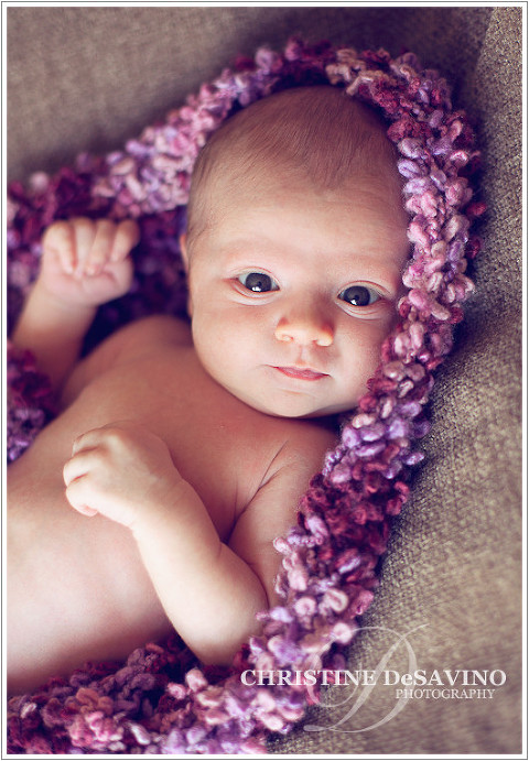 Beautiful newborn girl in a pink knit wrap - NJ Newborn Photographer