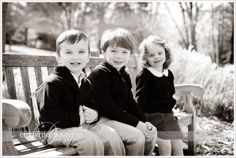 Black and white of three cousins on a bench -  NJ Child Photographer