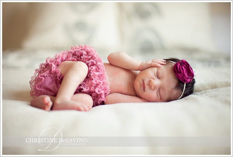 Newborn baby girl with pink bow & bloomers - NJ Newborn Photographer