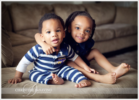 Sister and baby brother on the couch - NJ Children's Photographer