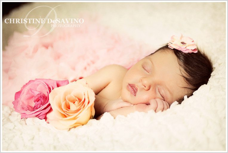 Beautiful newborn girl with roses - NJ Newborn Photographer Beautiful newborn girl with roses - NJ Newborn Photographer