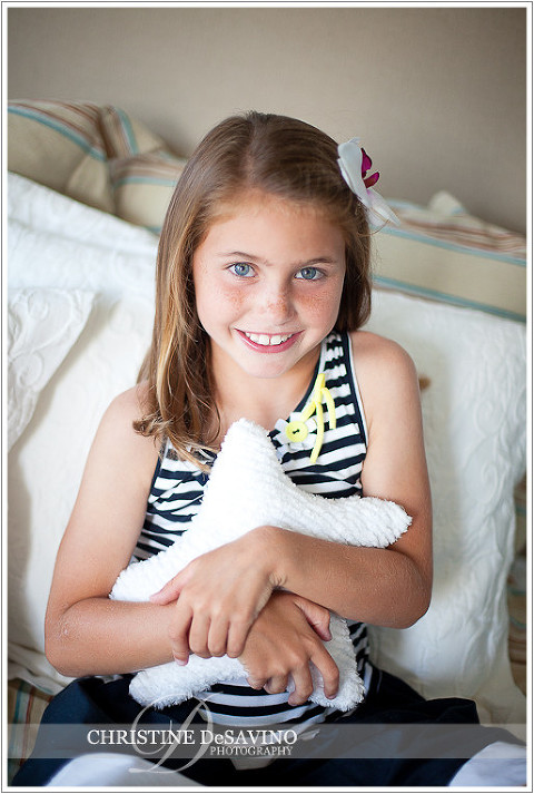 Beautiful girl hugging pillow - NJ Child Photographer