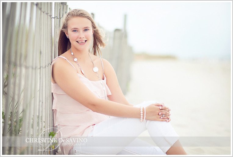 Beautiful girl sitting in sand dunes - NJ Beach Photographer