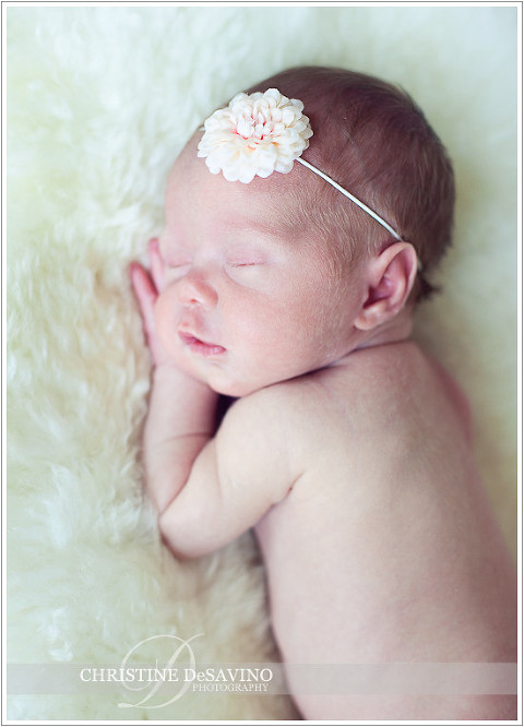 Baby girl sleeping on faux fur - NJ Baby Photographer