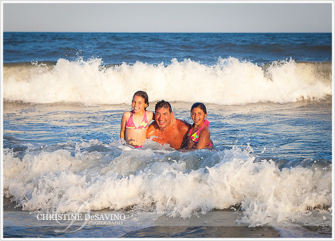 Family swimming in ocean at LBI - NJ Beach Photographer