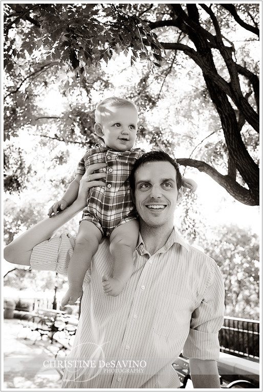 Boy on daddy's shoulders in Battery Park - NYC Child Photographer