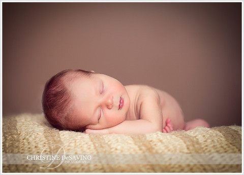 Newborn boy sleeps peacefully - NJ Baby Photographer