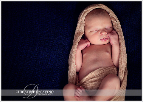 Newborn boy in cheesecloth wrap - NJ Newborn Photographer