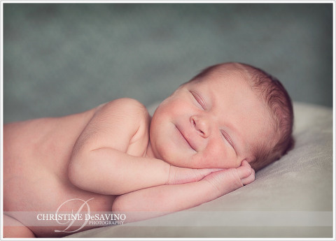 Smiling newborn boy - NJ Baby Photographer